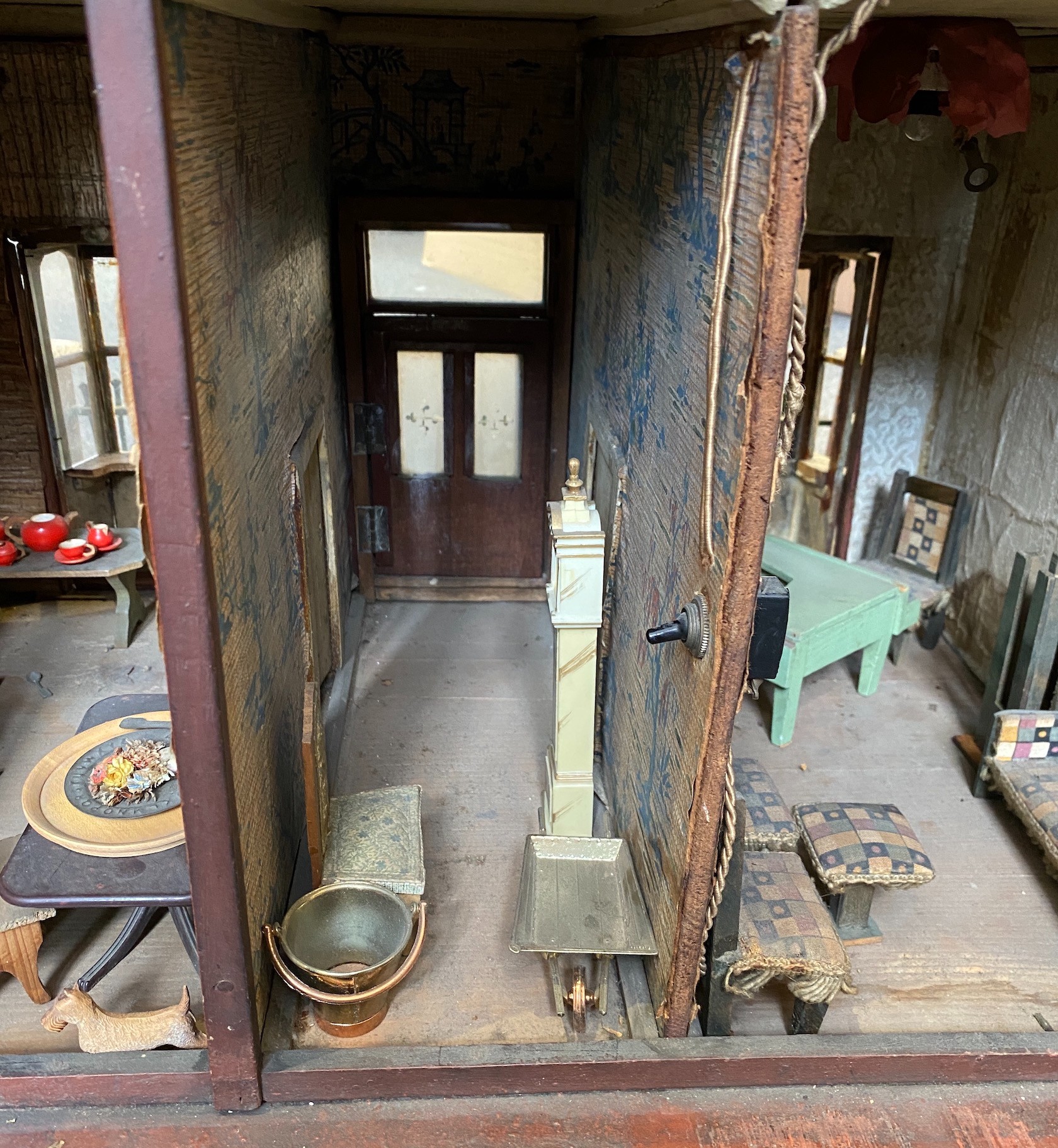 A back-opening furnished English dolls’ house, late 19th century, 74cm high